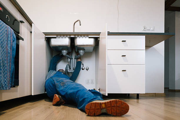 Professional Pipe Repair technician working in Russell, IL